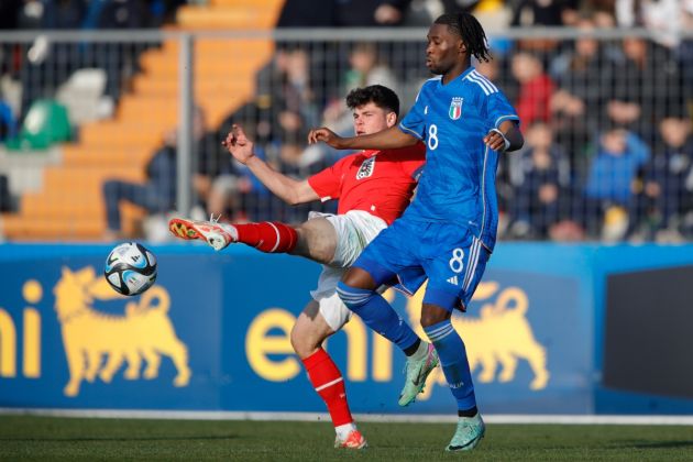LIGNANO SABBIADORO, ITALY - FEBRUARY 14: Luca Pazourek of Austria and Halid Djankpata of Italy contest the ball during the International Friendly match between Italy U19 and Austria U19 at Stadio Guido Teghil on February 14, 2024 in Lignano Sabbiadoro, Italy. (Photo by Timothy Rogers/Getty Images)