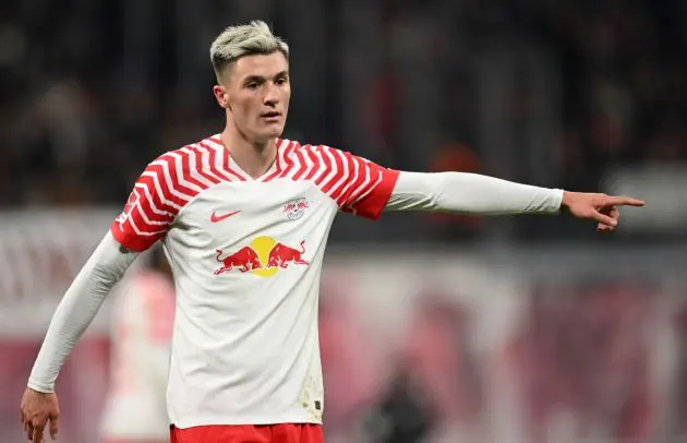 LEIPZIG, GERMANY - JANUARY 20: Benjamin Sesko of Leipzig points during the Bundesliga match between RB Leipzig and Bayer 04 Leverkusen at Red Bull Arena on January 20, 2024 in Leipzig, Germany. (Photo by Stuart Franklin/Getty Images)