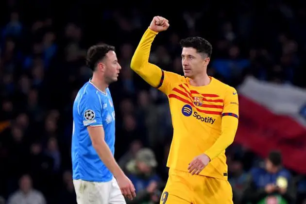 TOPSHOT - Barcelona forward #09 Robert Lewandowski (R) celebrates after scoring a goal during the UEFA Champions League round of 16 first Leg football match between Napoli and Barcelona at the Diego-Armando-Maradona stadium in Naples on February 21, 2024. (Photo by Tiziana FABI / AFP) (Photo by TIZIANA FABI/AFP via Getty Images)
