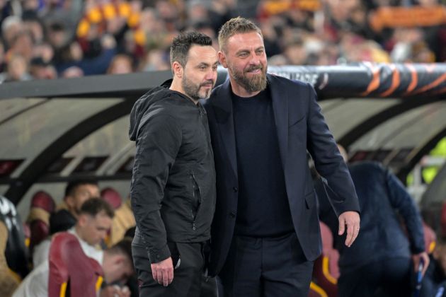 Brighton's Italian head coach Roberto De Zerbi (L) and Roma's Italian coach Daniele De Rossi (R) pose for a photograph in the technical area ahead of the UEFA Europa League last 16 first leg football match between AS Roma and Brighton and Hove Albion at the Olympic Stadium in Rome on March 7, 2024. (Photo by Andreas SOLARO / AFP) (Photo by ANDREAS SOLARO/AFP via Getty Images)