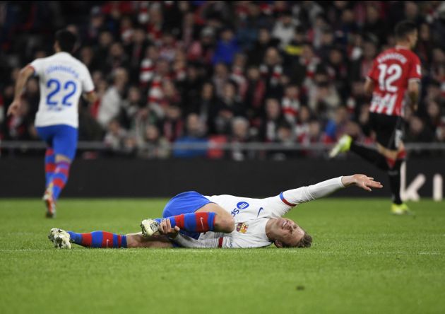 Barcelona's Dutch midfielder #21 Frenkie De Jong reacts to resulting injured during the Spanish league football match between Athletic Club Bilbao and FC Barcelona at the San Mames stadium in Bilbao on March 3, 2024. (Photo by ANDER GILLENEA / AFP) (Photo by ANDER GILLENEA/AFP via Getty Images)