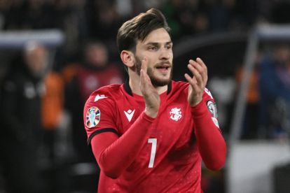 Georgia's midfielder #07 Khvicha Kvaratskhelia reacts during the UEFA EURO 2024 qualifying play-off final football match between Georgia and Greece in Tbilisi on March 26, 2024. (Photo by Vano SHLAMOV / AFP) (Photo by VANO SHLAMOV/AFP via Getty Images)