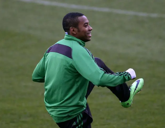 AC Milan's Brazilian forward Robinho takes part to a training session at the Vicente Calderon stadium in Madrid on March 10, 2014 on the eve of their UEFA Champions League quarter-finals second leg football match against Atletico de Madrid. AFP PHOTO/ PIERRE-PHILIPPE MARCOU (Photo by Pierre-Philippe MARCOU / AFP) (Photo by PIERRE-PHILIPPE MARCOU/AFP via Getty Images)