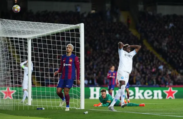 BARCELONA, SPAIN - MARCH 12: Victor Osimhen of SSC Napoli reacts after a missed chance during the UEFA Champions League 2023/24 round of 16 second leg match between FC Barcelona and SSC Napoli at Estadi Olimpic Lluis Companys on March 12, 2024 in Barcelona, Spain. (Photo by Alex Caparros/Getty Images)