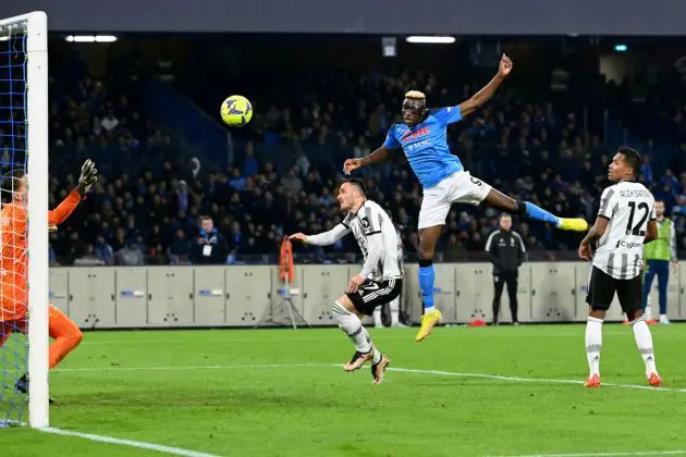 Napoli's Nigerian forward Victor Osimhen (2nd R) heads the ball to score a goal during the Italian Serie A football match between Napoli and Juventus at the Diego-Maradona stadium in Naples on January 13, 2023. (Photo by Alberto PIZZOLI / AFP) (Photo by ALBERTO PIZZOLI/AFP via Getty Images)
