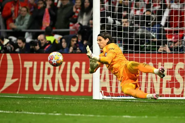 Inter Milan's Swiss goalkeeper #01 Yann Sommer stops the ball during the penalty shoot-out session during the UEFA Champions League last 16 second leg football match between Club Atletico de Madrid and Inter Milan at the Metropolitano stadium in Madrid on March 13, 2024. (Photo by JAVIER SORIANO / AFP) (Photo by JAVIER SORIANO/AFP via Getty Images)