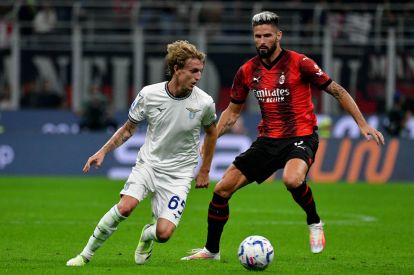 MILAN, ITALY - SEPTEMBER 30: Nicolò Rovella of SS Lazio compete for the ball with Olivier Giroud of AC Milan during the Serie A TIM match between AC Milan and SS Lazio at Stadio Giuseppe Meazza on September 30, 2023 in Milan, Italy. (Photo by Marco Rosi - SS Lazio/Getty Images)