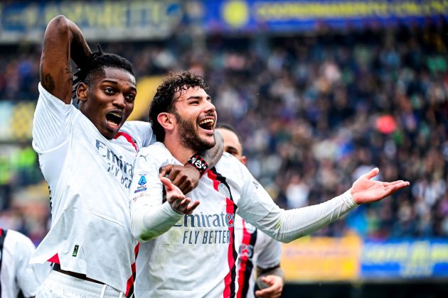 VERONA, ITALY - MARCH 17: Theo Hernandez of AC Milan celebrates scoring his team's first goal with teammate Rafael Leao during the Serie A TIM match between Hellas Verona FC and AC Milan at Stadio Marcantonio Bentegodi on March 17, 2024 in Verona, Italy. (Photo by Alessandro Sabattini/Getty Images)