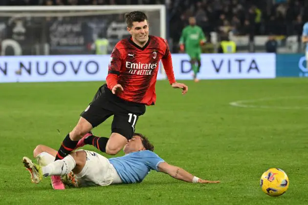 AC Milan forward Christian Pulisic fights for the ball with Lazio's Italian defender #03 Luca Pellegrini during the Italian Serie A football match between Lazio and AC Milan on March 01, 2024 at the Olympic stadium in Rome. (Photo by Alberto PIZZOLI / AFP)