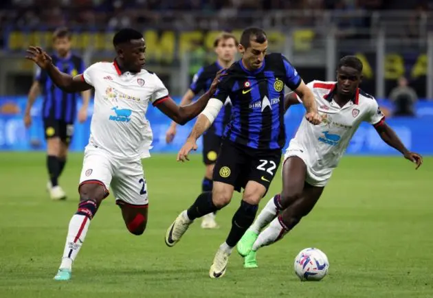 Inter Milan’s Henrih Mkhitaryan (C) challenges for the ball with Cagliari's Zito Luvumbo (R) ands teammate Ibrahim Sulemana during the Italian Serie A soccer match between Fc Inter and Cagliari at Giuseppe Meazza stadium in Milan, Italy, 14 April 2024. EPA-EFE/MATTEO BAZZI