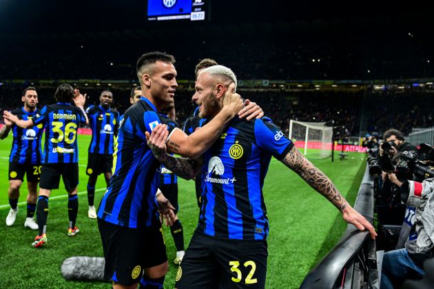 Inter defender Federico Dimarco (R) celebrates with Inter Milan's Argentine forward #10 Lautaro Martinez after scoring his team first goal during the Italian Serie A football match between Inter Milan and Empoli in Milan, on April 1, 2024. (Photo by Piero CRUCIATTI / AFP) (Photo by PIERO CRUCIATTI/AFP via Getty Images)
