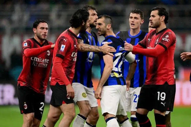 AC Milan's French midfielder #07 Yacine Adli (2nd-L) argues with Inter Milan's Armenian midfielder #22 Henrikh Mkhitaryan (3rd-R) during the Italian Serie A football match between AC Milan and Inter Milan at the San Siro Stadium in Milan on April 22, 2024. (Photo by Marco BERTORELLO / AFP) (Photo by MARCO BERTORELLO/AFP via Getty Images)