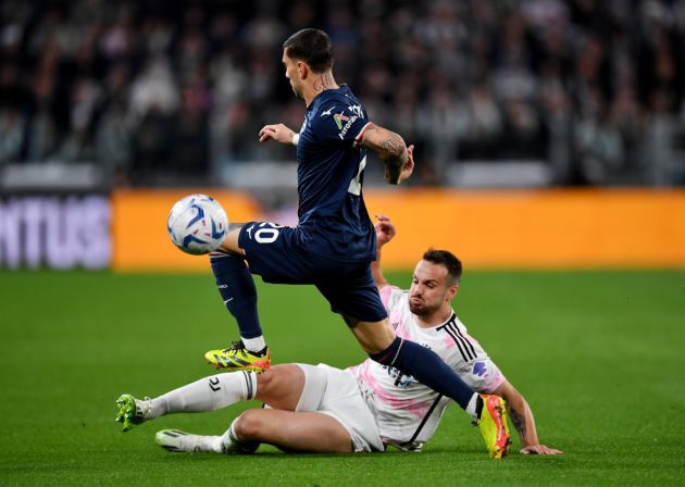 TURIN, ITALY - APRIL 02: Mattia Zaccagni of SS Lazio is challenged by during the Coppa Italia Semi-Final match between Juventus FC and SS Lazio at the Allianz Stadium on April 02, 2024 in Turin, Italy. (Photo by Valerio Pennicino/Getty Images)