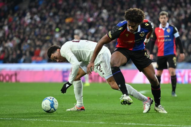 BASEL, SWITZERLAND - JANUARY 06: Jamal Musiala of FC Bayern München is tackled by Renato Veiga of FC Basel during the friendly match between FC Basel and FC Bayern München at St. Jakob-Park on January 06, 2024 in Basel, Switzerland. (Photo by Christian Kaspar-Bartke/Getty Images)