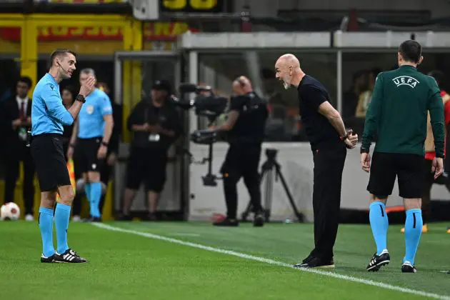 AC Milan's Italian coach Stefano Pioli argues with French referee Clement Turpin during the UEFA Europa League football match between AC Milan and AS Roma at San Siro Stadium, in Milan on April 11, 2024. (Photo by Isabella BONOTTO / AFP) (Photo by ISABELLA BONOTTO/AFP via Getty Images)