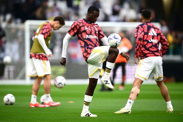 Juventus' American forward #22 Tim Weah warms up prior to the Italian Serie A football match between Juventus and AC Milan at The Allianz Stadium in Turin on April 27, 2024. (Photo by MARCO BERTORELLO / AFP) (Photo by MARCO BERTORELLO/AFP via Getty Images)