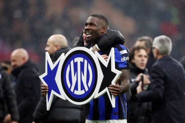 MILAN, ITALY - APRIL 22: Marcus Thuram of FC Inter celebrates winning the Serie A TIM title after winning the Serie A TIM match between AC Milan and FC Internazionale at Stadio Giuseppe Meazza on April 22, 2024 in Milan, Italy. (Photo by Marco Luzzani/Getty Images)