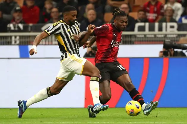 MILAN, ITALY - OCTOBER 22: Bremer of Juventus FC battles for possession with Rafael Leao of AC Milan during the Serie A TIM match between AC Milan and Juventus FC at Stadio Giuseppe Meazza on October 22, 2023 in Milan, Italy. (Photo by Marco Luzzani/Getty Images)