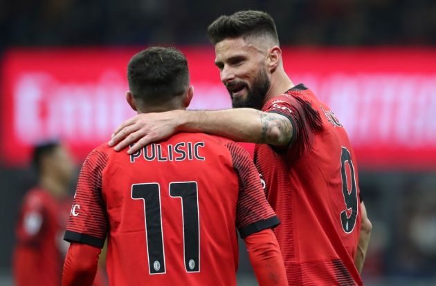 MILAN, ITALY - DECEMBER 30: Olivier Giroud of AC Milan interacts with his team-mate Christian Pulisic during the Serie A TIM match between AC Milan and US Sassuolo at Stadio Giuseppe Meazza on December 30, 2023 in Milan, Italy. (Photo by Marco Luzzani/Getty Images)