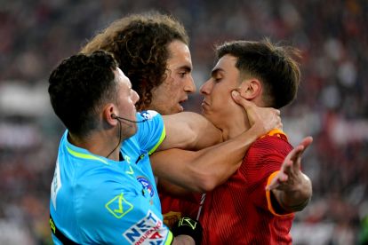 ROME, ITALY - APRIL 06: Matteo Guendouzi of SS Lazio and Paolo Dybala of AS Roma recats during the Serie A TIM Derby della Capitale between AS Roma and SS Lazio - Serie A TIM at Stadio Olimpico on April 06, 2024 in Rome, Italy. (Photo by Marco Rosi - SS Lazio/Getty Images)