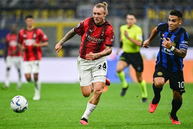 AC Milan defender Simon Kjaer fights for the ball with Inter Milan forward Lautaro Martinez during the Italian Serie A football match between Inter Milan and AC Milan at the San Siro Stadium in Milan on September 16, 2023. (Photo by GABRIEL BOUYS / AFP) (Photo by GABRIEL BOUYS/AFP via Getty Images)