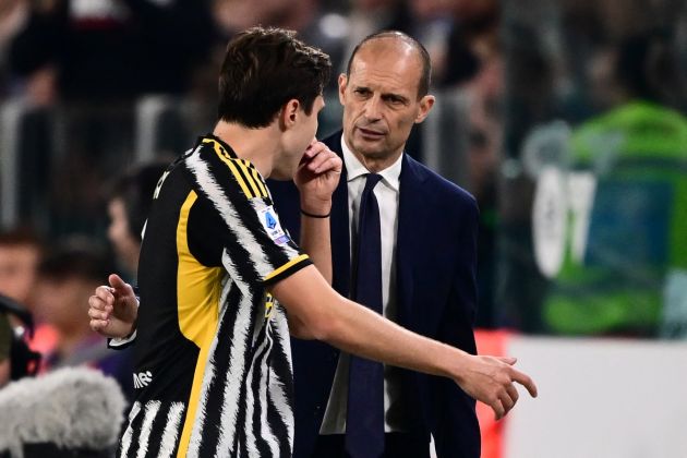 Juventus forward Federico Chiesa speaks with Juventus' Italian coach Massimiliano Allegri as he leaves the pitch during the Italian Serie A football match between Juventus and Fiorentina, at The Allianz Stadium, in Turin on April 7, 2024. (Photo by Marco BERTORELLO / AFP) (Photo by MARCO BERTORELLO/AFP via Getty Images)