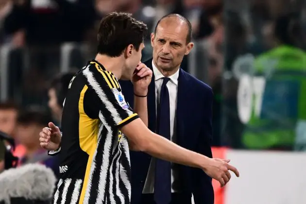Juventus forward Federico Chiesa speaks with Juventus' Italian coach Massimiliano Allegri as he leaves the pitch during the Italian Serie A football match between Juventus and Fiorentina, at The Allianz Stadium, in Turin on April 7, 2024. (Photo by Marco BERTORELLO / AFP) (Photo by MARCO BERTORELLO/AFP via Getty Images)