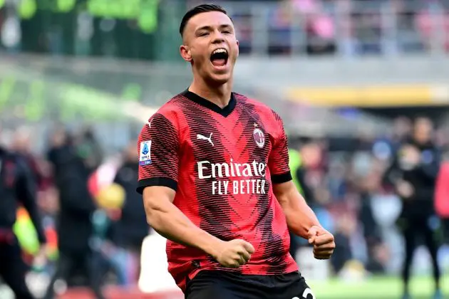 Milan defender Jan-Carlo Simic celebrates after scoring during the Italian Serie A football match AC Milan vs Monza on December 17, 2023 at the "San Siro Stadium" in Milan. (Photo by MARCO BERTORELLO / AFP) (Photo by MARCO BERTORELLO/AFP via Getty Images)