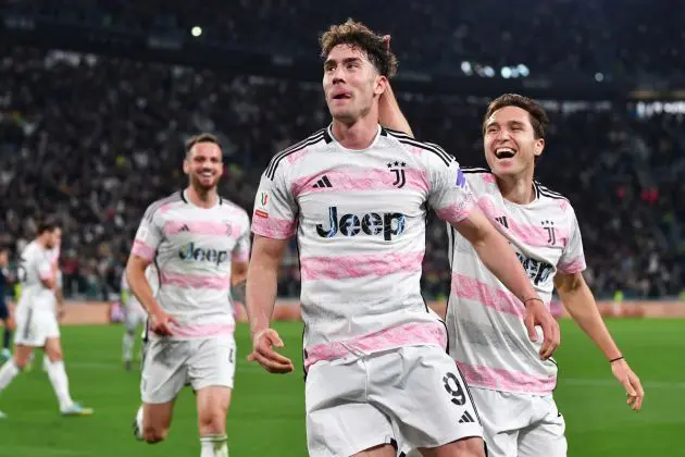 TURIN, ITALY - APRIL 02: Serie A star Dusan Vlahovic of Juventus celebrates scoring his team's second goal alongside teammate Federico Chiesa during the Coppa Italia Semi-Final match between Juventus FC and SS Lazio at the Allianz Stadium on April 02, 2024 in Turin, Italy. (Photo by Valerio Pennicino/Getty Images)