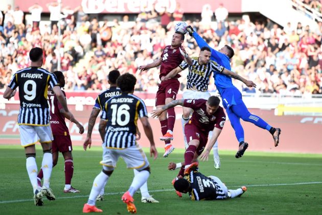 TURIN, ITALY - APRIL 13: Alessandro Buongiorno of Torino FC battles for possession with Federico Gatti and Wojciech Szczesny of Juventus during the Serie A TIM match between Torino FC and Juventus at Stadio Olimpico di Torino on April 13, 2024 in Turin, Italy. (Photo by Valerio Pennicino/Getty Images)