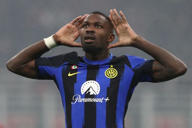 MILAN, ITALY - APRIL 22: Marcus Thuram of FC Inter celebrates after scoring his team's second goalduring the Serie A TIM match between AC Milan and FC Internazionale at Stadio Giuseppe Meazza on April 22, 2024 in Milan, Italy. (Photo by Marco Luzzani/Getty Images)