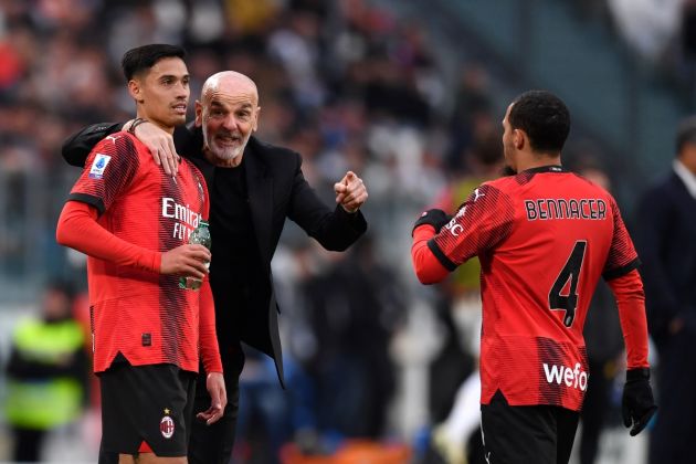 TURIN, ITALY - APRIL 27: Stefano Pioli, Head Coach of AC Milan, speaks with Tijjani Reijnders and Ismael Bennacer of AC Milan during the Serie A TIM match between Juventus and AC Milan at Allianz Stadium on April 27, 2024 in Turin, Italy. (Photo by Valerio Pennicino/Getty Images)