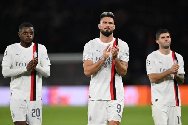 PARIS, FRANCE - OCTOBER 25: Pierre Kalulu, Olivier Giroud and Christian Pulisic of AC Milan look dejected as they applaud the fans at full-time following their team's defeat in the UEFA Champions League match between Paris Saint-Germain and AC Milan at Parc des Princes on October 25, 2023 in Paris, France. (Photo by Mike Hewitt/Getty Images)
