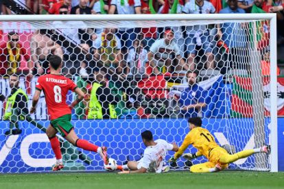 Turkey's defender #02 Zeki Celik (C) and Turkey's goalkeeper #12 Altay Bayindir (R) try to prevent the ball crossing the line after a back pass, own-goal from Turkey's defender #04 Samet Akaydin gives Portugal a 2-0 lead during the UEFA Euro 2024 Group F football match between Turkey and Portugal at the BVB Stadion in Dortmund on June 22, 2024. (Photo by INA FASSBENDER / AFP) (Photo by INA FASSBENDER/AFP via Getty Images)