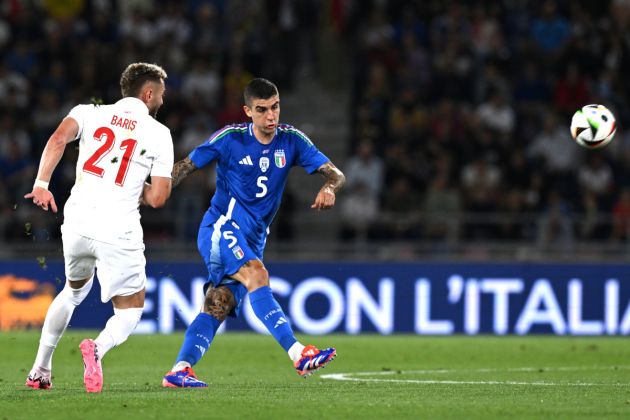 BOLOGNA, ITALY - JUNE 04: Gianluca Mancini of Italy competes for the ball with Baris Alper Yilmaz of Turkiye during International Friendly match between Italy and Turkiye at Renato Dall'Ara Stadium on June 04, 2024 in Bologna, Italy. (Photo by Claudio Villa/Getty Images)