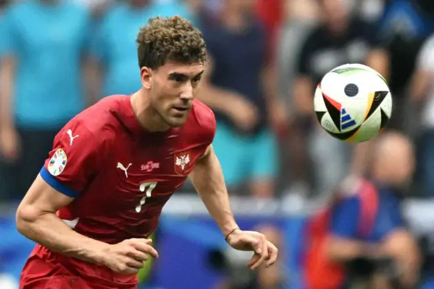 Serbia's forward #07 Dusan Vlahovic runs for the ball during the UEFA Euro 2024 Group C football match between Slovenia and Serbia at the Munich Football Arena in Munich on June 20, 2024. (Photo by MIGUEL MEDINA / AFP) (Photo by MIGUEL MEDINA/AFP via Getty Images)