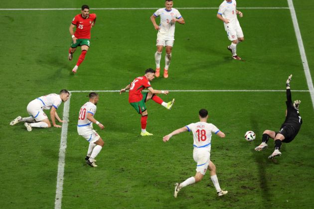 LEIPZIG, GERMANY - JUNE 18: Francisco Conceicao of Portugal scores his team's second goal as Jindrich Stanek of Czechia fails to make a save during the UEFA EURO 2024 group stage match between Portugal and Czechia at Football Stadium Leipzig on June 18, 2024 in Leipzig, Germany. (Photo by Julian Finney/Getty Images)