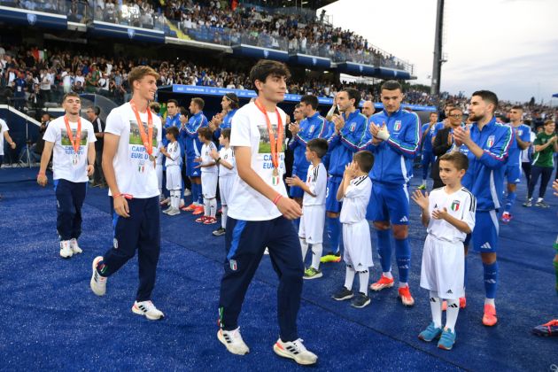 EMPOLI, ITALY - JUNE 09: Players of Italy U17 enter on the pitch for celebrate the victory of UEFA European Under 17-Championship 2023/2024 before an International Friendly match between Italy and Bosnia & Herzegovina at Stadio Carlo Castellani on June 09, 2024 in Empoli, Italy. (Photo by Claudio Villa/Getty Images)