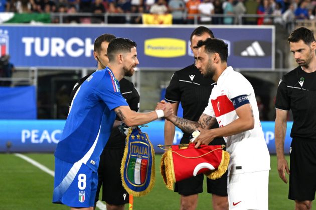 BOLOGNA, ITALY - JUNE 04: The captains of Italy and Turkiye Jorginho (L) and Hakan Calhanoglu (R) exchanges the pennants before International Friendly match between Italy and Turkiye at Renato Dall'Ara Stadium on June 04, 2024 in Bologna, Italy. (Photo by Claudio Villa/Getty Images)