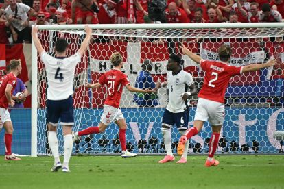 Denmark's midfielder #21 Morten Hjulmand (C) celebrates scoring his team's first goal during the UEFA Euro 2024 Group C football match between Denmark and England at the Frankfurt Arena in Frankfurt am Main on June 20, 2024. (Photo by JAVIER SORIANO / AFP) (Photo by JAVIER SORIANO/AFP via Getty Images)