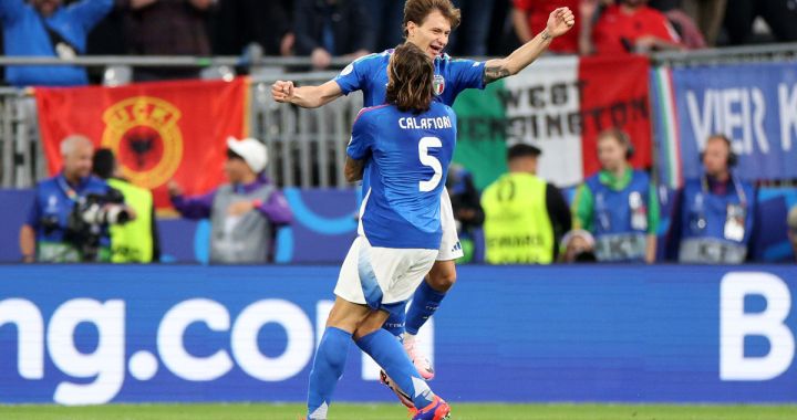 DORTMUND, GERMANY - JUNE 15: Nicolo Barella of Italy celebrates scoring his team's second goal with teammate Riccardo Calafiori during the UEFA EURO 2024 group stage match between Italy and Albania at Football Stadium Dortmund on June 15, 2024 in Dortmund, Germany. (Photo by Dean Mouhtaropoulos/Getty Images)