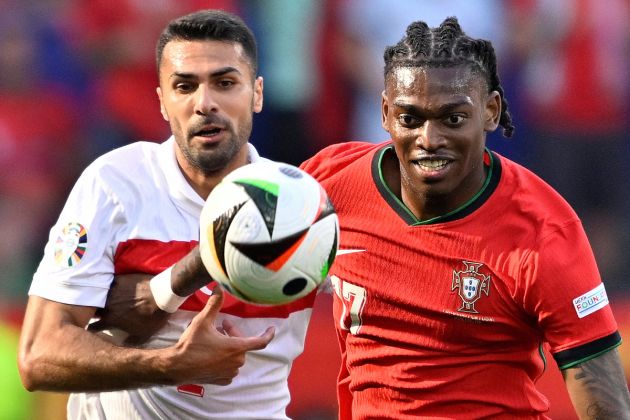 TOPSHOT - Portugal's forward #17 Rafael Leao fights for the ball with Turkey's defender #02 Zeki Celik during the UEFA Euro 2024 Group F football match between Turkey and Portugal at the BVB Stadion in Dortmund on June 22, 2024. (Photo by INA FASSBENDER / AFP) (Photo by INA FASSBENDER/AFP via Getty Images)