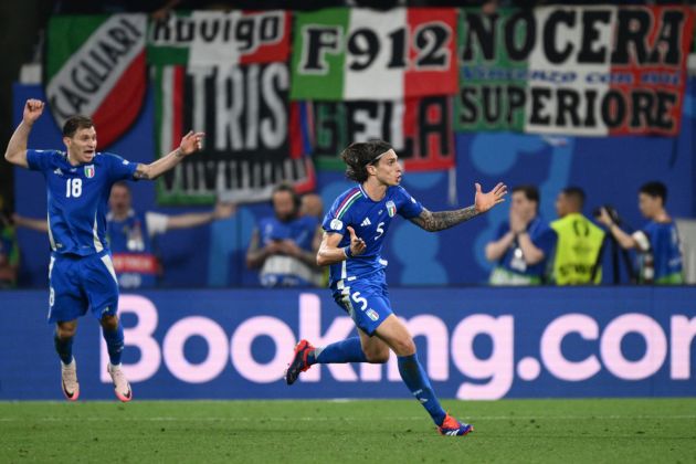 Italy's defender #05 Riccardo Calafiori (C) and Italy's midfielder #18 Nicolo Barella (L) celebrate a late goal from Italy's forward #20 Mattia Zaccagni (not pictured) during the UEFA Euro 2024 Group B football match between the Croatia and Italy at the Leipzig Stadium in Leipzig on June 24, 2024. (Photo by Christophe SIMON / AFP) (Photo by CHRISTOPHE SIMON/AFP via Getty Images)