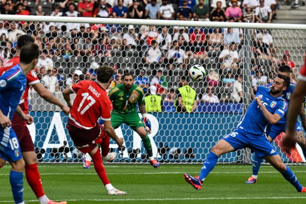 Switzerland's midfielder #17 Ruben Vargas kicks to score his team's second goal during the UEFA Euro 2024 round of 16 football match between Switzerland and Italy at the Olympiastadion Berlin in Berlin on June 29, 2024. (Photo by Fabrice COFFRINI / AFP) (Photo by FABRICE COFFRINI/AFP via Getty Images)