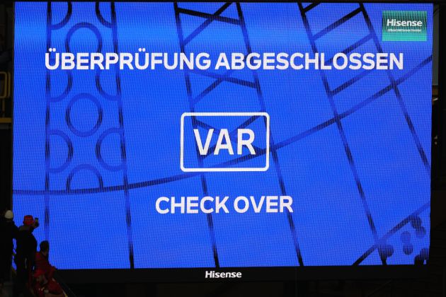 VAR screen DORTMUND, GERMANY - JUNE 15: The LED Screen displays a message from the Video Assistant Referee which reads "Check Over" during the UEFA EURO 2024 group stage match between Italy and Albania at Football Stadium Dortmund on June 15, 2024 in Dortmund, Germany. (Photo by Kevin C. Cox/Getty Images)