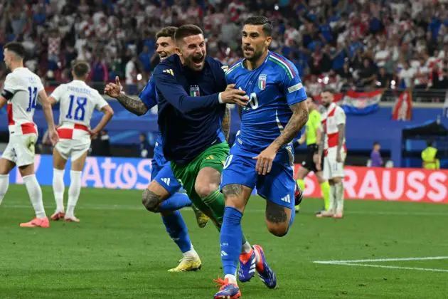 LEIPZIG, GERMANY - JUNE 24: Mattia Zaccagni of Italy celebrates with teammates after scoring his team's first goal to equalise during the UEFA EURO 2024 group stage match between Croatia and Italy at Football Stadium Leipzig on June 24, 2024 in Leipzig, Germany. (Photo by Claudio Villa/Getty Images for FIGC)