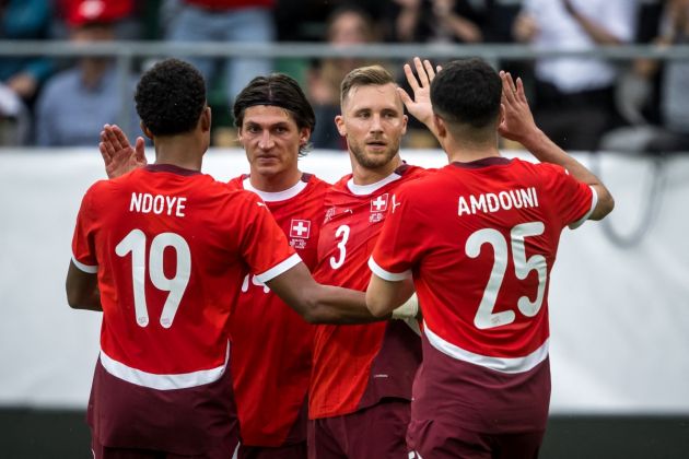 Pre Euro 2024 friendly - Switzerland defender Silvan Widmer celebrates with team mates scoring his team's first goal during the international friendly football match between Switzerland and Austria at Kybunpark stadium in St. Gallen, eastern Switzerland, on June 8, 2024. (Photo by Fabrice COFFRINI / AFP) (Photo by FABRICE COFFRINI/AFP via Getty Images)