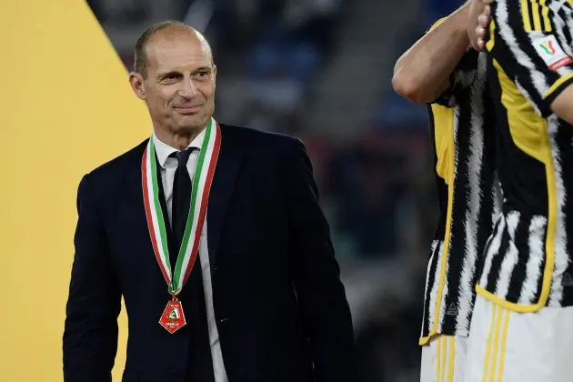 Juventus coach Massimiliano Allegri (L) stands with players as they celebrate their victory after the Italian Cup Final between Atalanta and Juventus at the Olympic stadium in Rome on May 15, 2024. (Photo by Filippo MONTEFORTE / AFP) (Photo by FILIPPO MONTEFORTE/AFP via Getty Images)