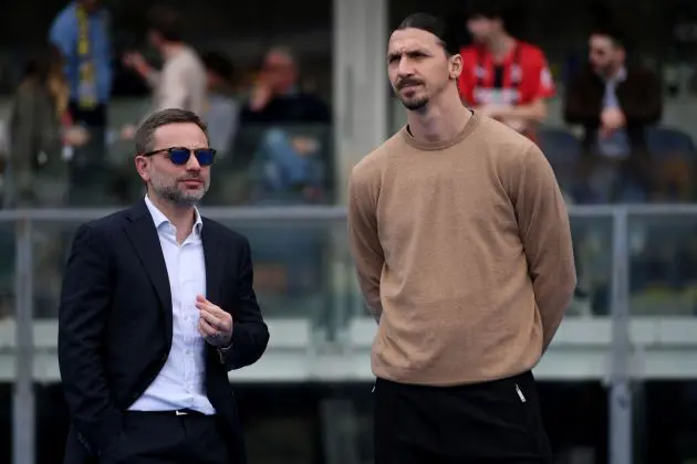 VERONA, ITALY - MARCH 17: Giorgio Furlani CEO of AC Milan interacts with Zlatan Ibrahimovic during the Serie A TIM match between Hellas Verona FC and AC Milan at Stadio Marcantonio Bentegodi on March 17, 2024 in Verona, Italy. (Photo by Alessandro Sabattini/Getty Images)