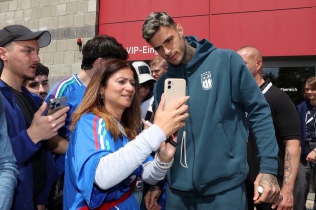 ISERLOHN, GERMANY - JUNE 13: Gianluca Scamacca of Italy signs autographs after Italy press conference at Hemberg-Stadion on June 13, 2024 in Iserlohn, Germany. (Photo by Claudio Villa/Getty Images for FIGC)